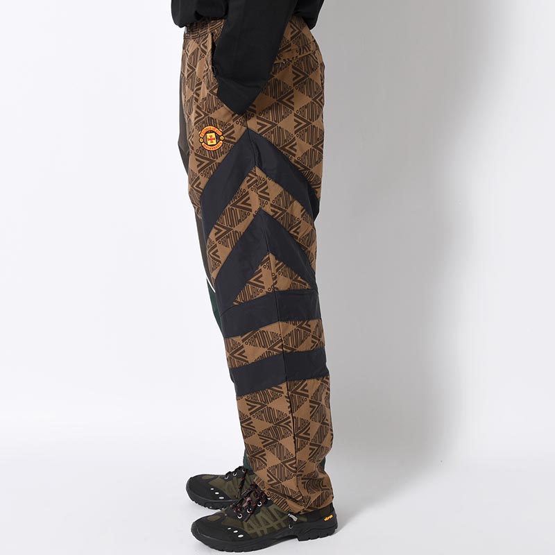 UMBRO CHANGEOVER TRACK PANTS -BROWN-